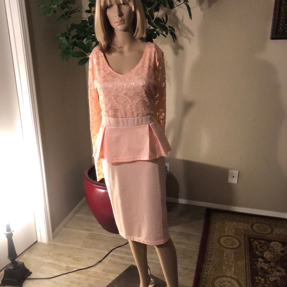 Pink peplum dress.